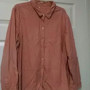 Long sleeve faded red color shirt.